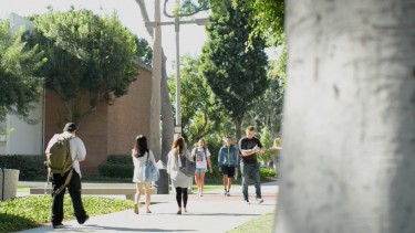 Students walking on campus.