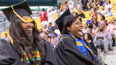 Students celebrate during the Pan-African cultural commencement celebration.