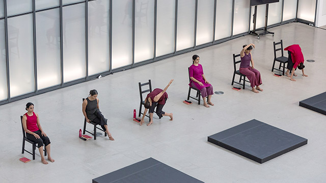 Performance Art with Women in Chairs