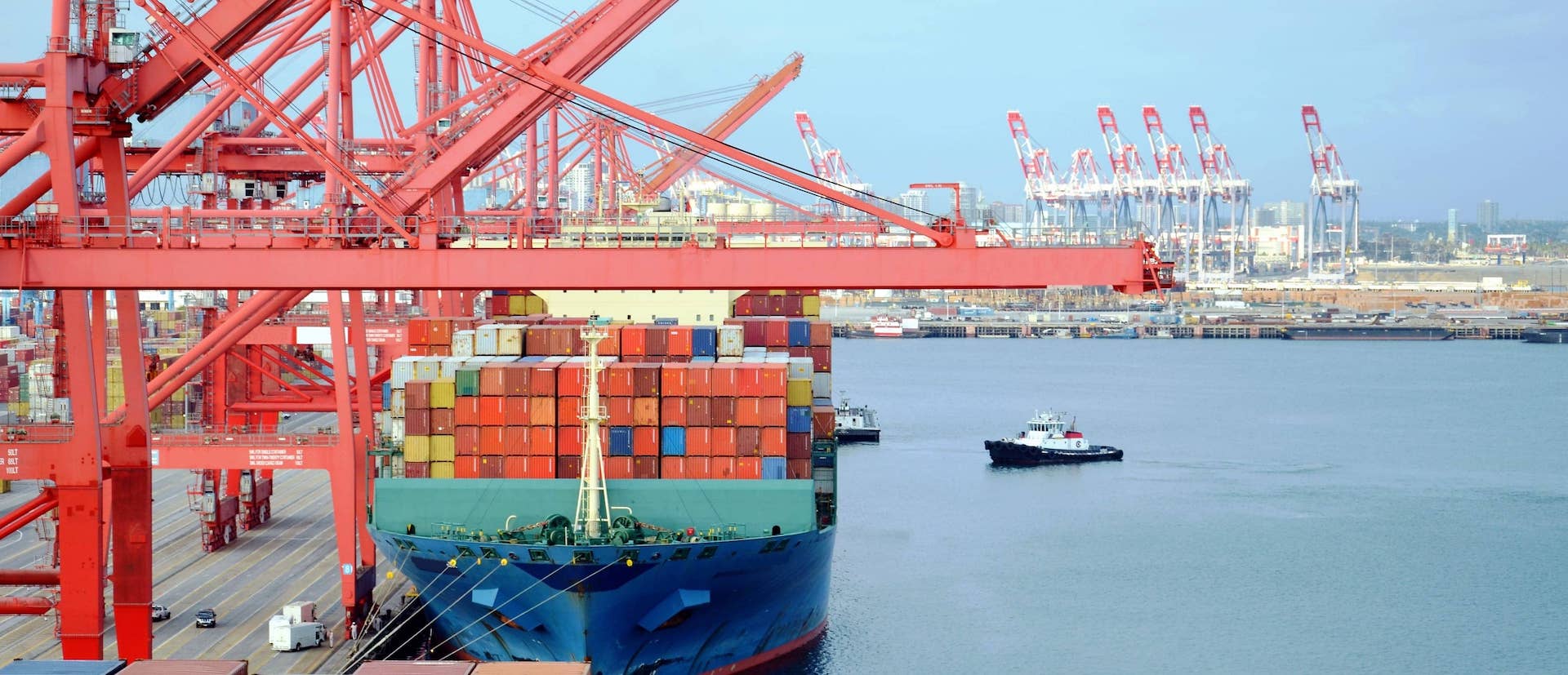 Port with cranes, boats and cargo