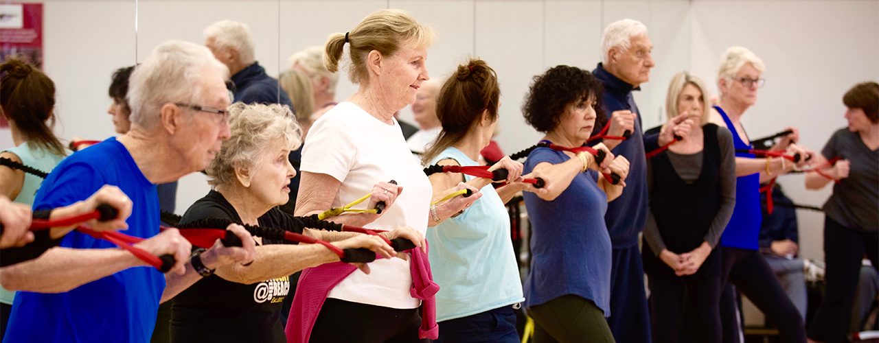 Seniors in a group fitness class.