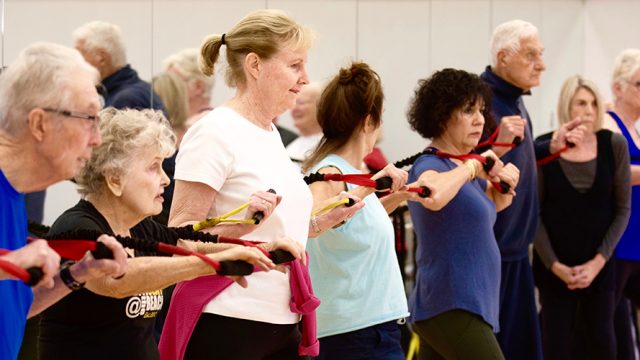 Seniors in a group fitness class.