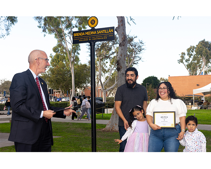 President Andrew Jones presentation of EOM Brenda Medina Santillan on friendship Walk
