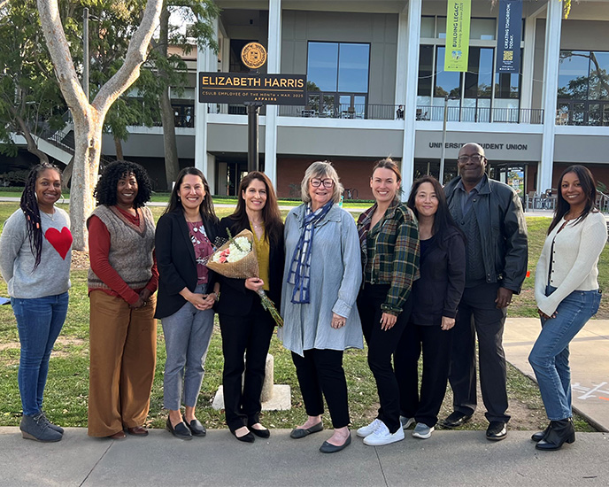 President Conloey joins Liz Harris and numerous colleagues on Friendship Walk