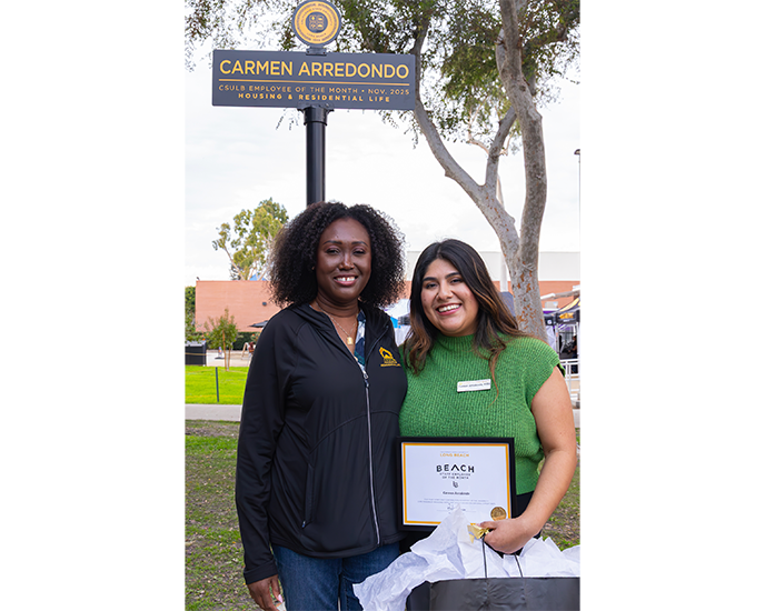 President Andrew Jones presentation of EOM Carmen Arredondo on friendship Walk