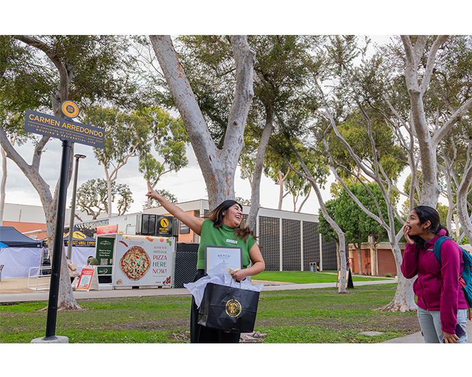President Andrew Jones presentation of EOM Carmen Arredondo on friendship Walk