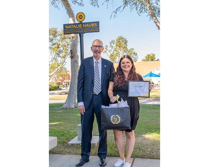 Natalie Haubs Empolyee of the Month sign on friendship Walk