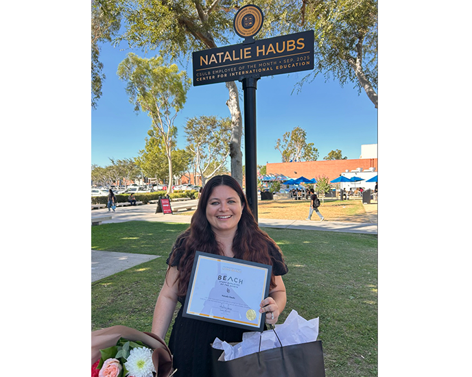 Natalie Haubs Empolyee of the Month sign on friendship Walk