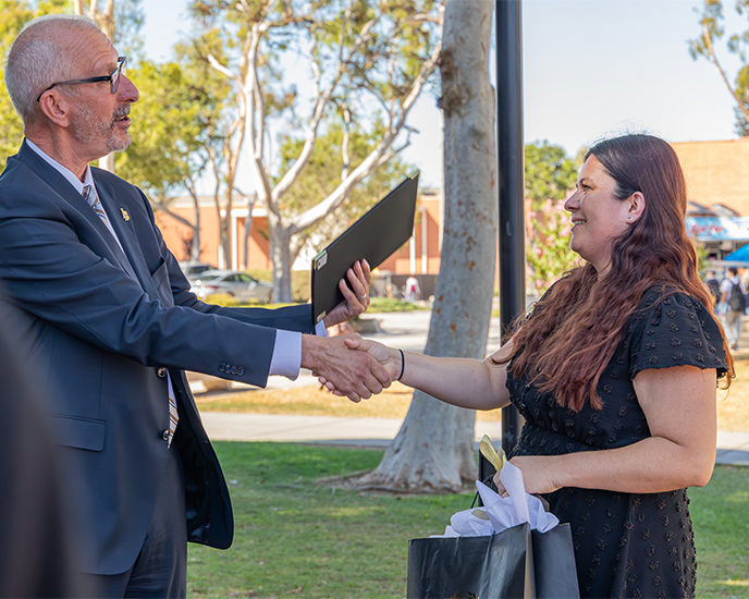  President Andrew Jones presentation of EOM Natalie Haubs on friendship Walk